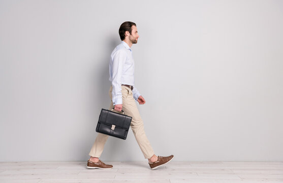 Full Length Body Size Profile Side View Of Nice Imposing Classy Man Director Walking Office Isolated Over Grey Pastel Color Background