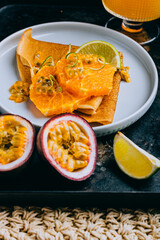 Crepes Or Thin Pancakes With Delicious passion fruit and lime.