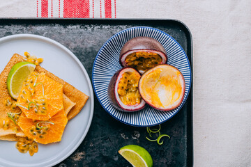 Crepes Or Thin Pancakes With Delicious passion fruit and lime.