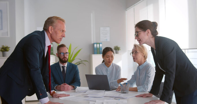 Business Colleagues Having Disagreement At Board Meeting