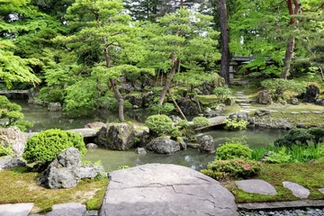 Fotobehang 日本の古い家の美しい庭の風景 © masamasa3