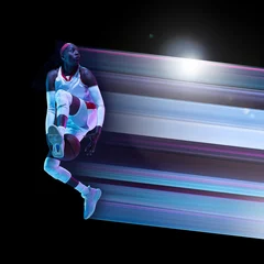 Poster Abstract desing, concept of sport, action, motion in sport. Young african female basketball player in neon on black background © master1305