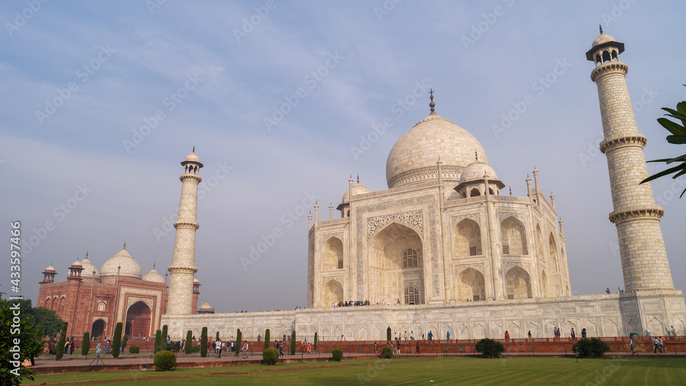 Sticker Taj Mahal ivory-white marble mausoleum on the south bank of Yamuna river in Agra, India