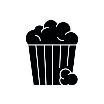 Popcorn glyph icon. Cinema. Vector isolated black illustration.