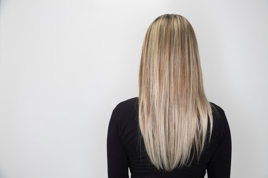 Side View Of Strait Hair With Highlights. Soft Focus