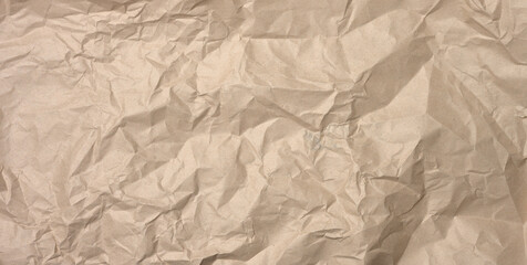 crumpled blank sheet of brown wrapping kraft paper, vintage texture for the designer