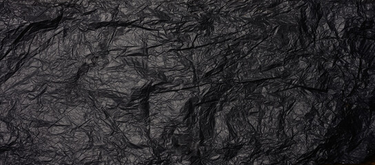 crumpled black paper, abstract texture background
