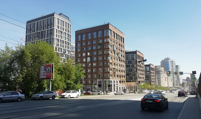 Obraz premium Yekaterinburg, Russia -10.05.2021: Modern residential high-rise buildings in Russia. Real estate background. Real estate market concept. Apartment building. New builded residential building. 