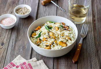 Risotto with mussels and spinach. Healthy food. Vegetarian food.