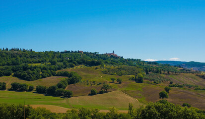 Late summer landscape in Val d'Orcia near San Quirico D'Orcia, Siena Province, Tuscany, Italy
