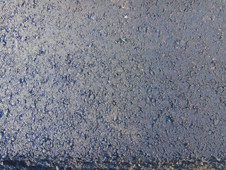 Close-up asphalt at the road under construction.