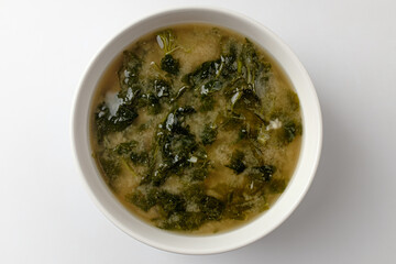 Mallow miso soup on a white background