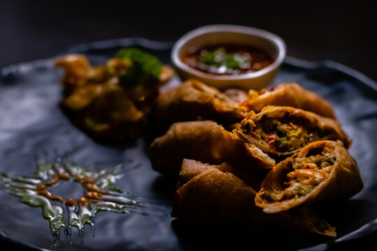 High Angle Close Up Of Beautiful Garnished Cheese & Bell Papper Roll