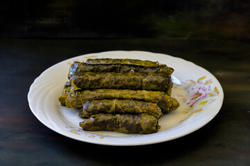 grape leaves, stuffed grape leaves, traditional food, dolmalar, sarmale, stuffed, lemon slices, appetizer