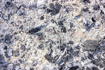 Ash gray. Ash texture. Burnt coals.