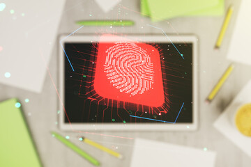 Double exposure of abstract creative fingerprint hologram and digital tablet on background, top view, research and development concept