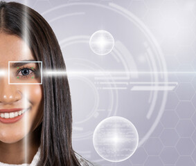 Eye scanning of asian young woman by laser light over the digital virtual technology background, vision and identification concept