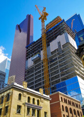 Modern architecture highrise skyscraper building towers with antenna in downtown construction...