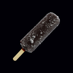 Chocolate ice cream lolly, chocolate glaze close-up with condensate and icing frost  isolated on black background. Ice cream bar,summer hot day. Cold yummy ice cream. Ice lolly concept background.