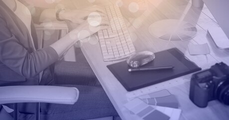 Composition of light over caucasian businesswoman in office