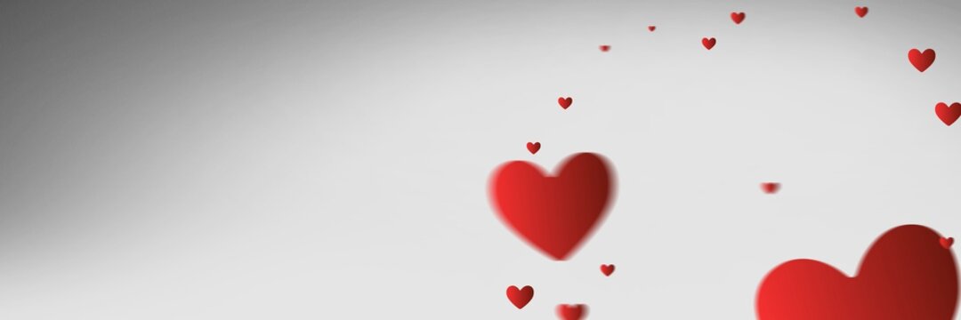 Composition of red hearts with copy space over grey background