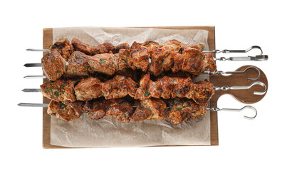 Metal skewers with delicious meat on white background, top view