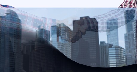 Technology background over mid section of two businessmen shaking hands against tall buildings