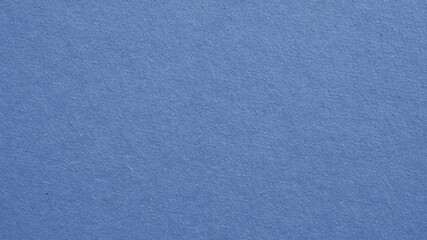 The surface of blue cardboard. Glamorous generic gray paperboard wallpaper. Paper texture with...