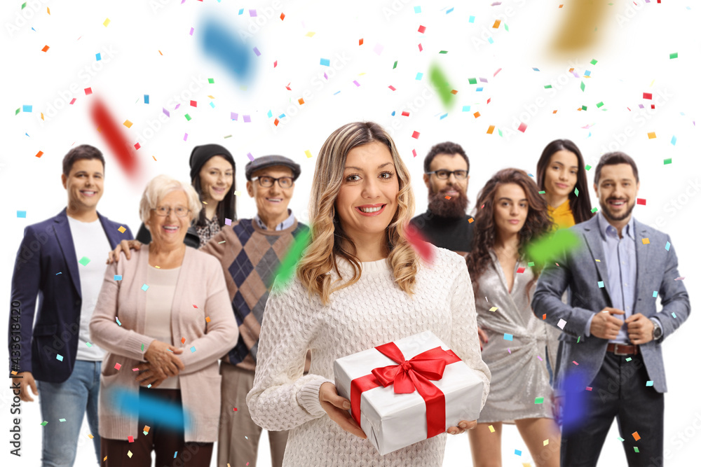 Sticker Woman holding a present at a celebration with friends and family and confetti around