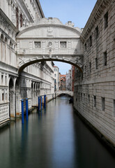 Fototapeta na wymiar Famous Bridge of Sighs in Venice in Italy photographed with the long time technique and the water that seems motionless