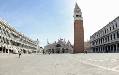 Piazza San Marco also called Saint Mark Square in Venice with the Basilica and the high bell tower...