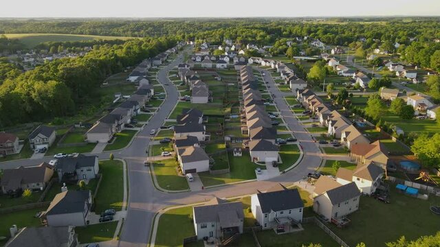 Beautiful overhead aerial footage of suburbs in Clarksville, Tennessee during golden hour