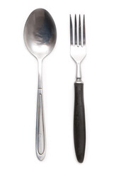 Metal spoon and fork isolated on a white background.