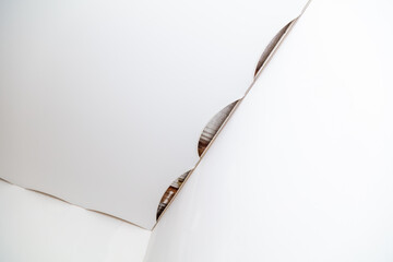 The technology of stretching the stretch ceiling in the room.