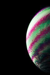Colourful bubbles. Abstract galaxy background with globe planet earth in universe space with sunlight on dark background. Abstract colorful soap bubble.