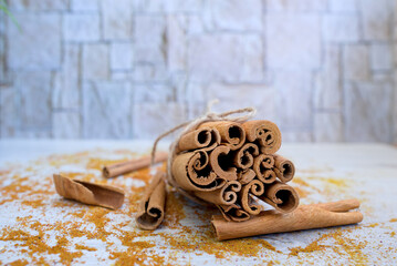 cinnamon sticks on a wooden background