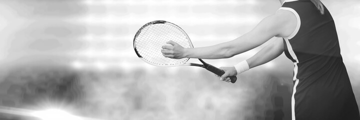 Obraz premium Composition of midsection of woman playing tennis over sports stadium in black and white