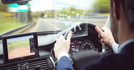Composition of data processing on interactive screen over businessman driving car