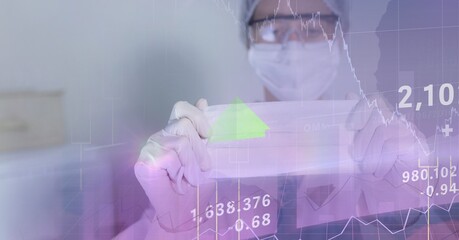 Composition of medical data processing over doctor in ppe suit holding face mask