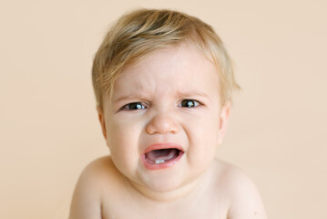 1-year-old boy crying angry