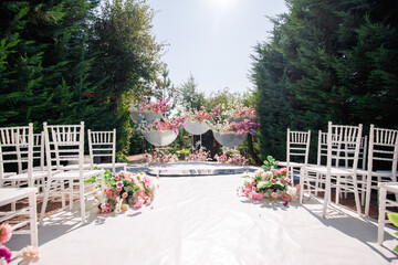 Decorative design of a wedding arch with flowers.