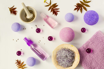 Composition with organic natural cosmetic products on white background. Top view, flat lay. Beauty, skin, hair or body care concept. Self-care beauty and relaxation routine. Lavender and yellow colors