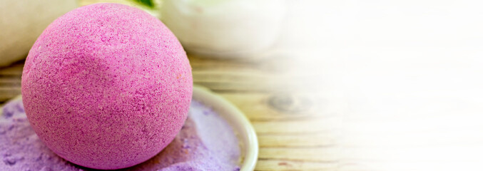 alt pink bath bomb with lavender close-up. Handmade natural cosmetics banner