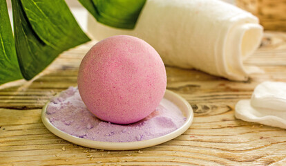 Salt pink bath bomb with lavender close-up. Natural cosmetics handmade background