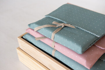 blue and pink baby gift box with ribbon and wood box