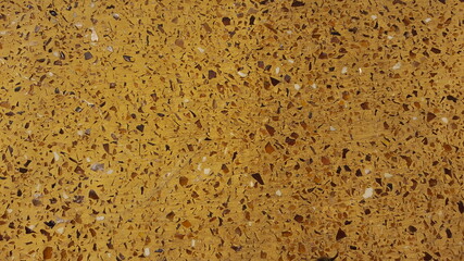 flat red granite stone texture with black and white knick-knacks.suitable for background