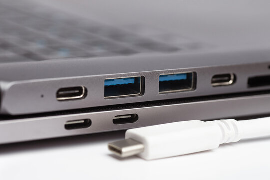 Close-up photo of laptop type-c port, type-c hub and type-c cable
