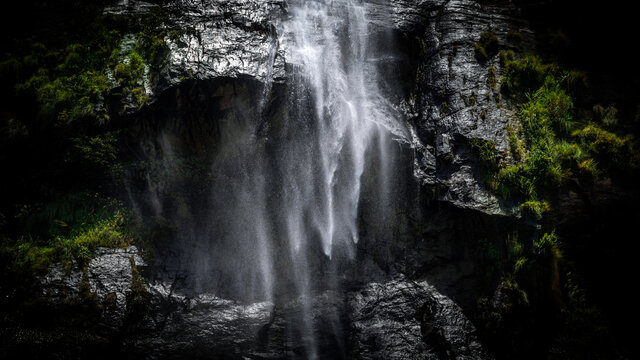 Stream of fresh water pouring down through the rocks in a tropical forest, natural beauty of the mother earth concept, Diyaluma falls in Koslanda, Badulla. the second-highest waterfall in Sri Lanka.