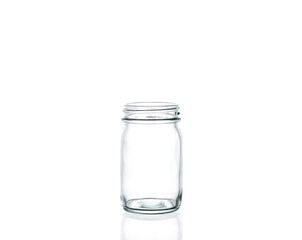 Empty glass bottle on white background