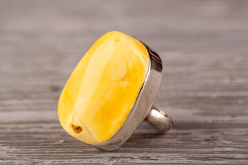 Ring in silver with landscape amber honey